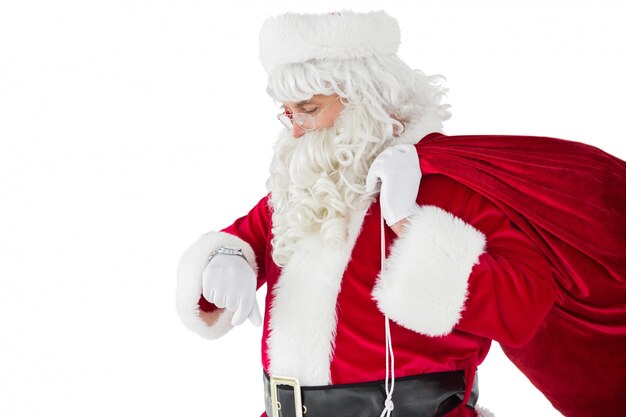 Festivo Babbo Natale che controlla il tempo