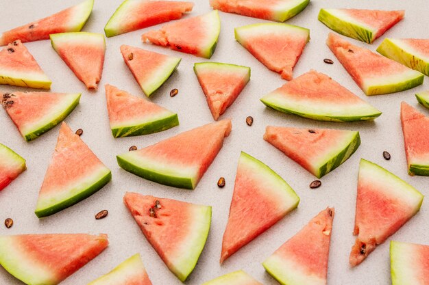 Fette succose fresche di anguria. Concetto sano di cibo del dessert dolce di estate