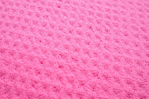 Fibre di spugna spugna texture pattern superficie closeup rosa magenta sfondo