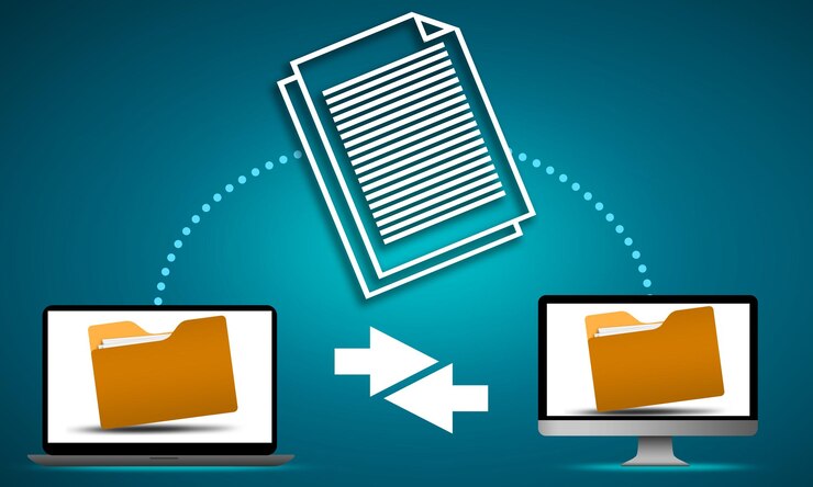 Photo file sharing concept with data transfer between computers