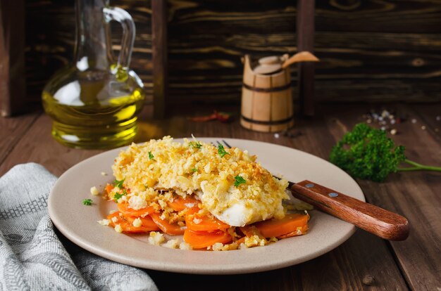 Filetto di pesce al forno con carote in crosta