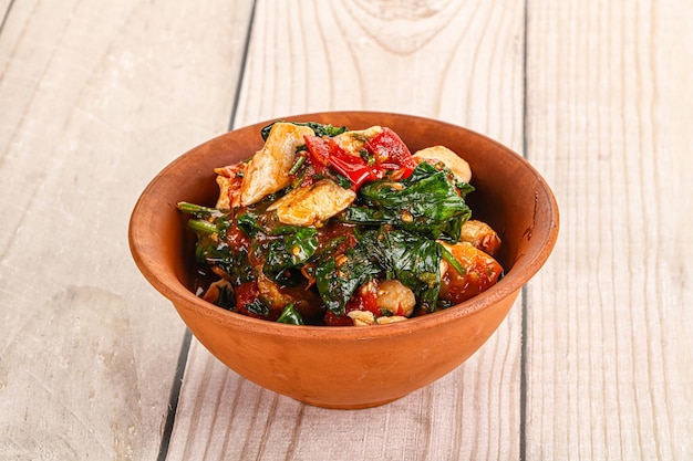 Filetto di pollo con pomodoro e spinaci