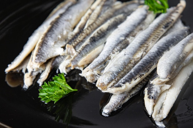 filetto di sardine acciughe frutti di mare pasto sano spuntino dieta sul tavolo copia spazio cibo