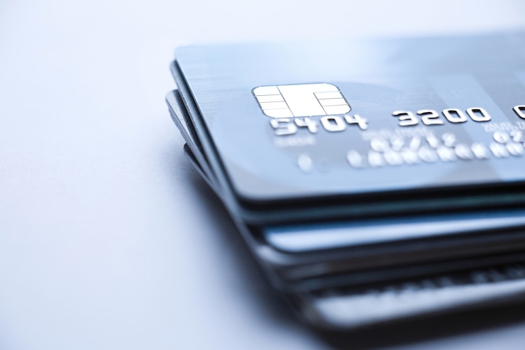 Photo finance concept,selective focus microchip on credit card or debit card.