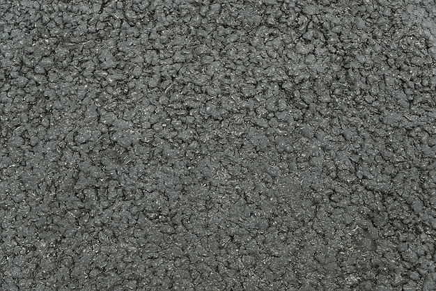 Fine di struttura del fondo dell&#39;asfalto grigio scuro su