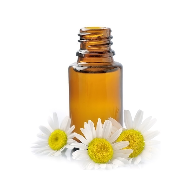 Fiori di camomilla con oli cosmetici