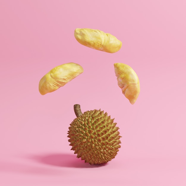 Float Durian su sfondo rosa pastello. concetto minimale.