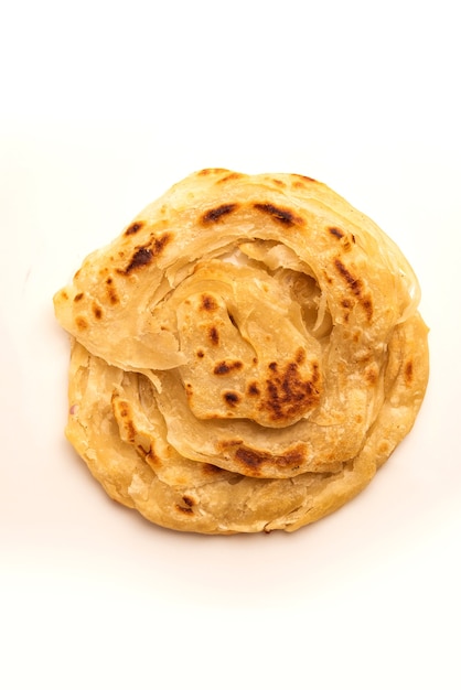 Focaccia indiana chiamata Laccha Paratha, composta da strati di farina di frumento o maida