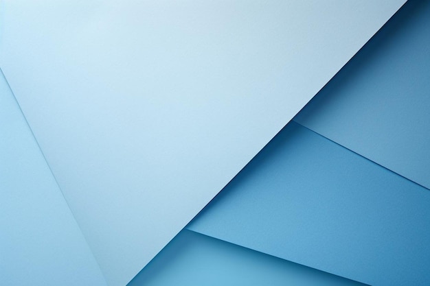Fogli di carta geometrici dai toni blu con spazio per la copia