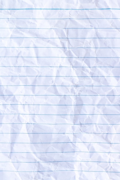 Foglio bianco foderato di sfondo di carta stropicciata del blocco note