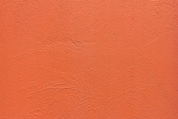 fondo arancio di struttura del muro di cemento