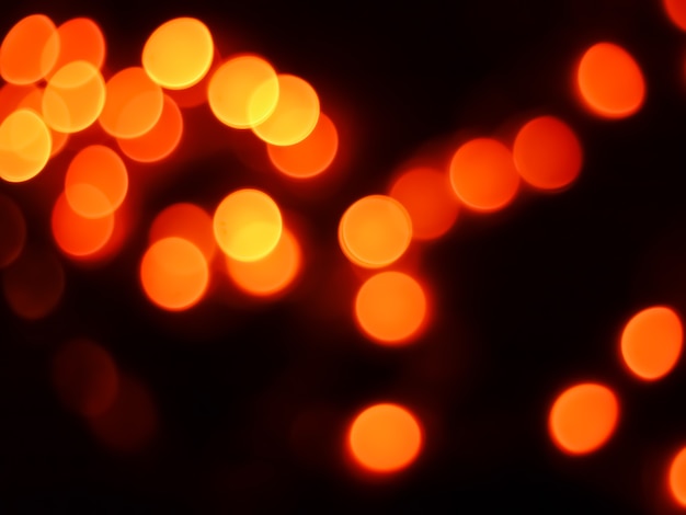 fondo astratto del bokeh con colore della luce del fuoco arancio