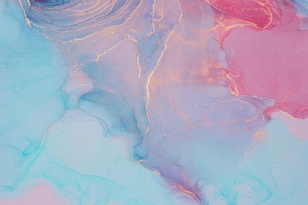 Fondo astratto della pittura dell'inchiostro liquido nei colori blu rosa