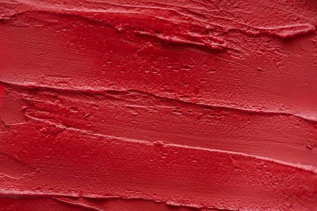 Fondo astratto di struttura del rossetto rosso