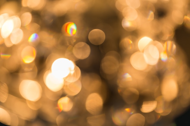 fondo astratto di uso dorato del bokeh per fondo