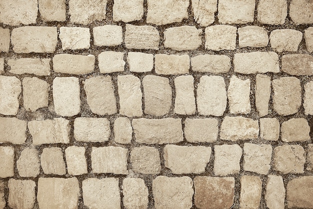 Fondo beige della pavimentazione di mosaico del granito
