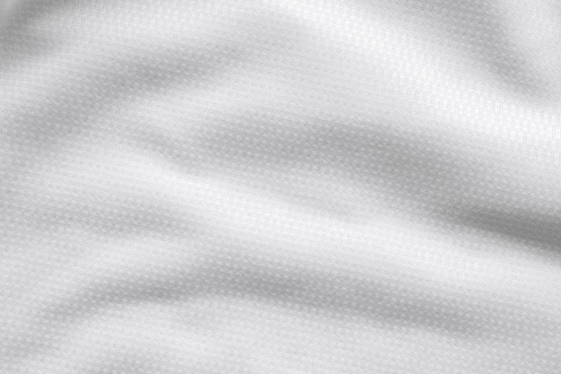 Fondo bianco di struttura della maglia della maglia da calcio del tessuto dell'abbigliamento sportivo