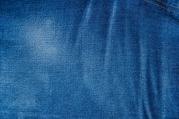 Fondo blu del jean, struttura dei jeans blu del denim, fondo dei jeans