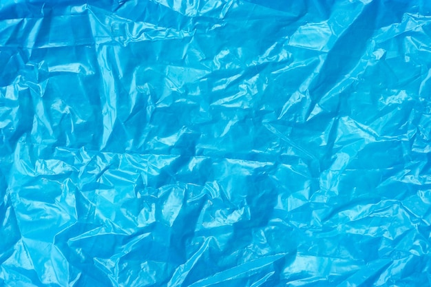 Fondo blu di struttura del sacchetto di plastica