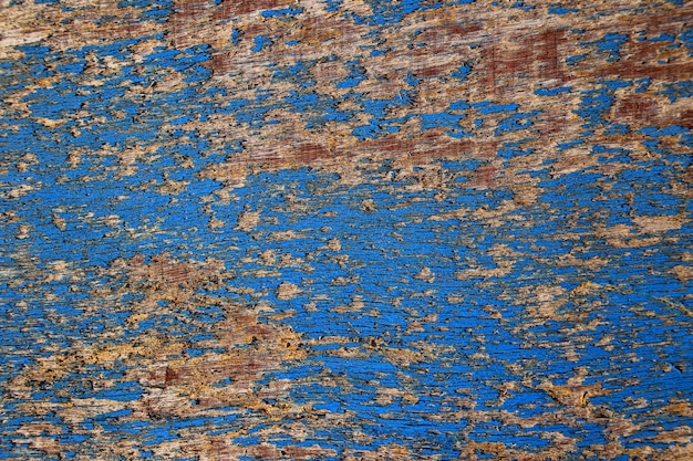 Fondo blu misero del bordo di legno