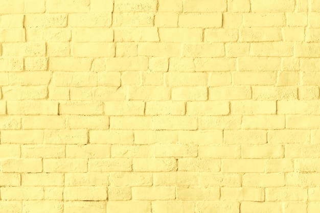 Fondo del modello del muro di mattoni giallo