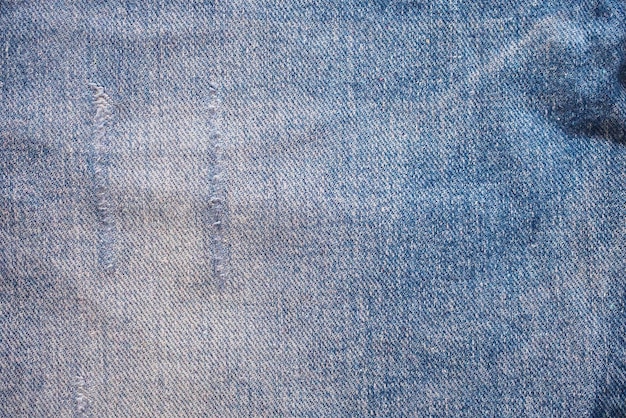 Fondo del modello di struttura dei jeans del denim