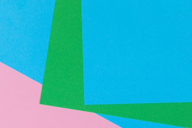 Fondo di carta di colore rosa pastello verde azzurro di forma geometrica astratta