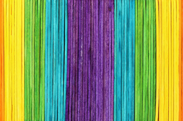Fondo di legno variopinto di struttura della parete nei colori luminosi dell'arcobaleno