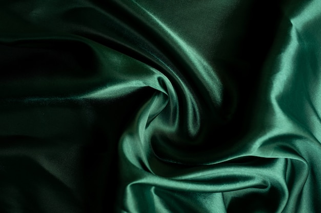 Fondo di struttura del tessuto verde, astratto, struttura del primo piano del panno