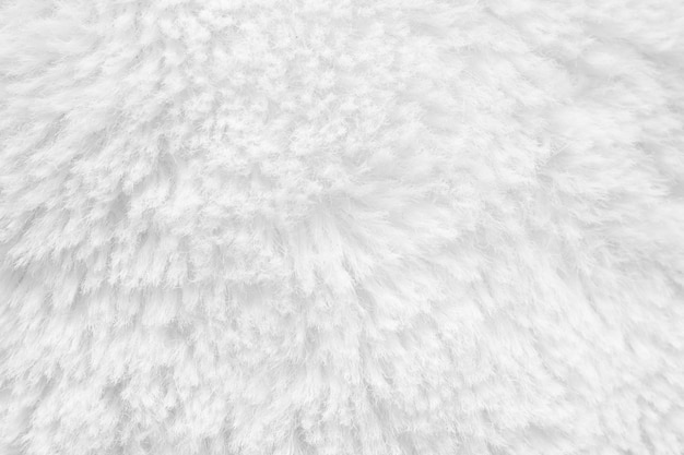 Fondo di struttura della lana del tessuto lanuginoso bianco della pelliccia