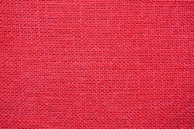 Fondo di struttura della tela di lino di colore rosso