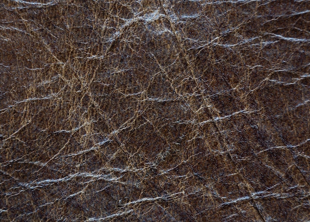 Fondo di struttura di cuoio marrone genuino. Materiale pelle bovina in pelle naturale.