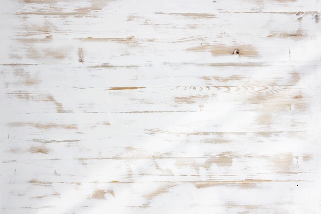 fondo di struttura di legno bianco con luce laterale della finestra