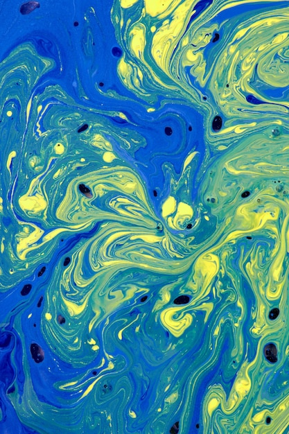 Fondo dipinto a mano astratto blu e giallo di due tonalità, pittura acrilica liquida. Concetto di arte contemporanea.