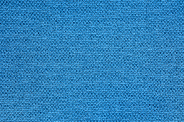 Fondo e struttura blu del tessuto con la vista dello spazio della copia da sopra