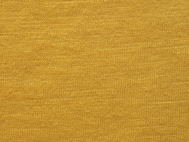 Fondo giallo di struttura del tessuto di cotone