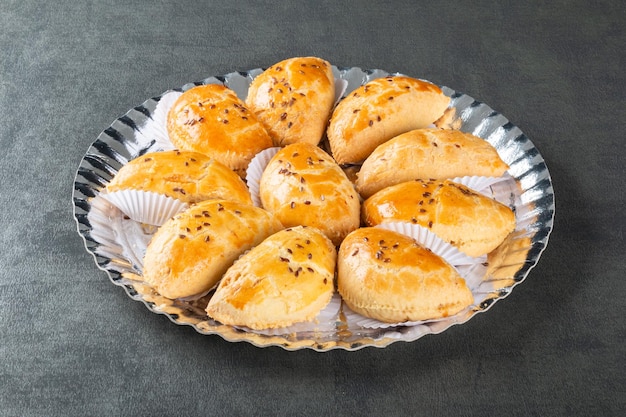 Fondo grigio dell'alimento del partito del pastello del forno