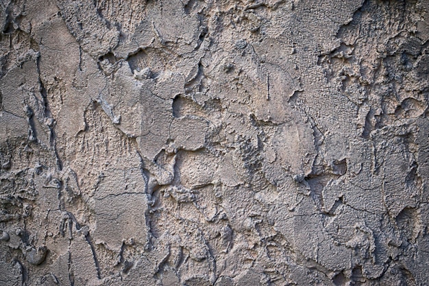 Fondo grigio dell'estratto di struttura del muro di cemento