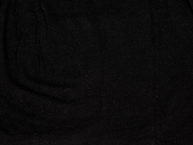 Fondo in cotone tessuto tela tela nera scura con pieghe orizzontali
