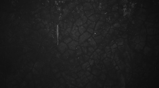 Fondo nero della parete del cemento strutturato del tratto del pennello naturale o della vecchia struttura concreta di pietra come concetto di orrore e Halloween