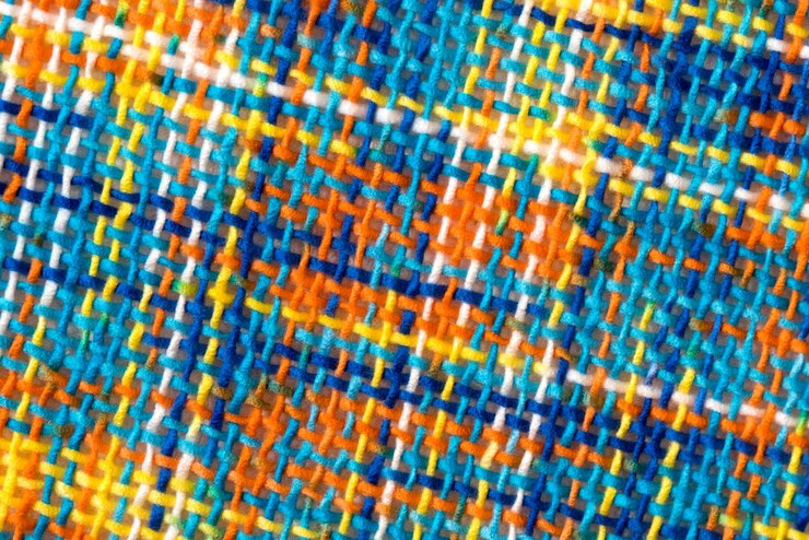 Foto fondo o struttura del tessuto bianco e arancione giallo blu a strisce