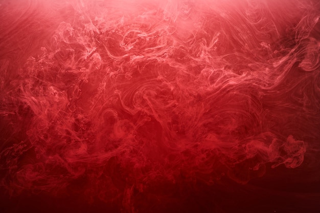 Fondo rosso astratto dell'oceano, pitture di rubino in acqua, carta da parati scarlatta del fumo luminoso vibrante