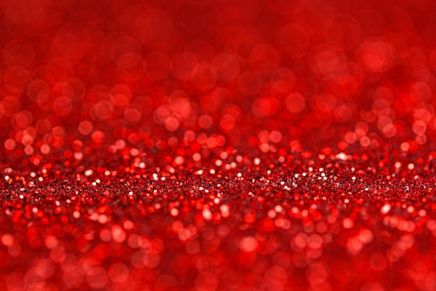 Fondo rosso dell'estratto del bokeh Fondo di Natale e del nuovo anno