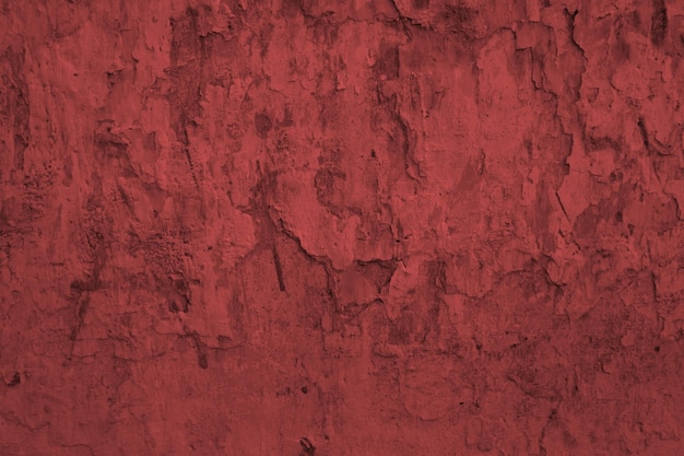 Fondo rosso dell'estratto del muro di cemento di lerciume