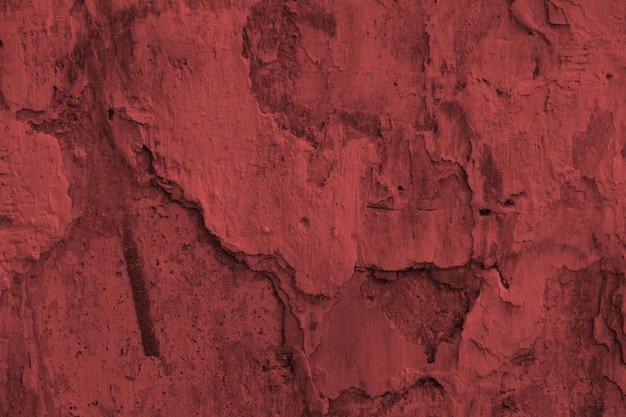 Fondo rosso dell'estratto del muro di cemento di lerciume