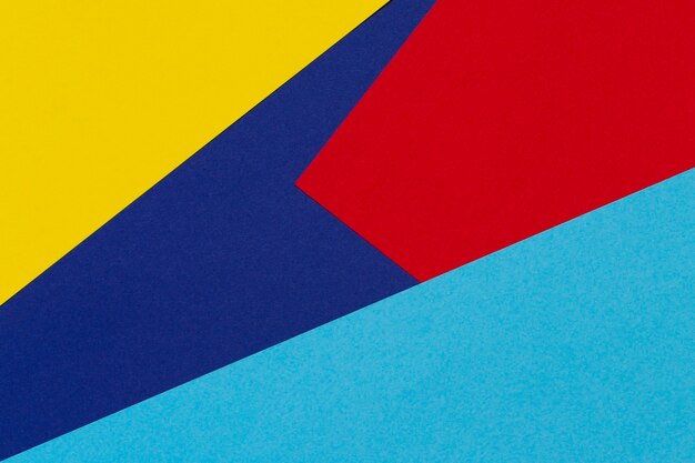 Fondo rosso e giallo blu astratto della composizione nella geometria della carta di colore