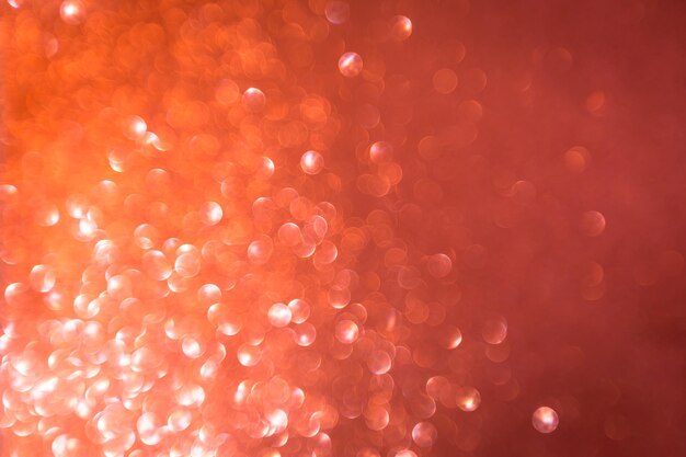 Fondo scintillante di scintillio strutturato di festa del bokeh rosso