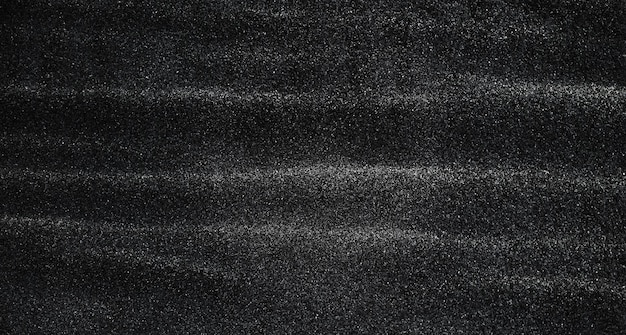Fondo scuro del grunge di struttura della sabbia nera