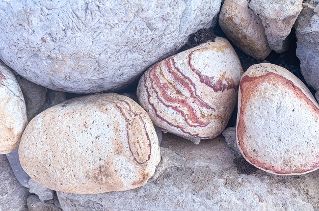 Fondo, struttura, parete di pietra naturale rotonda.