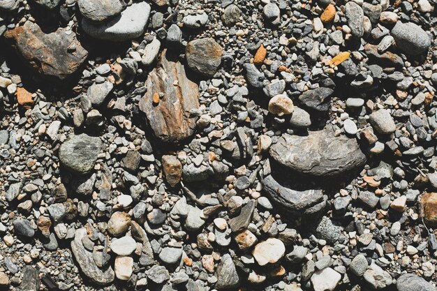 Fondo strutturato naturale del primo piano di struttura delle rocce del fiume